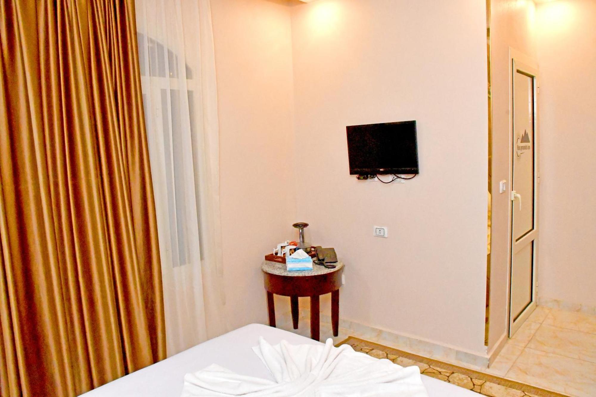 Nun Pyramids Hotel Kafrat al Jabal Номер фото
