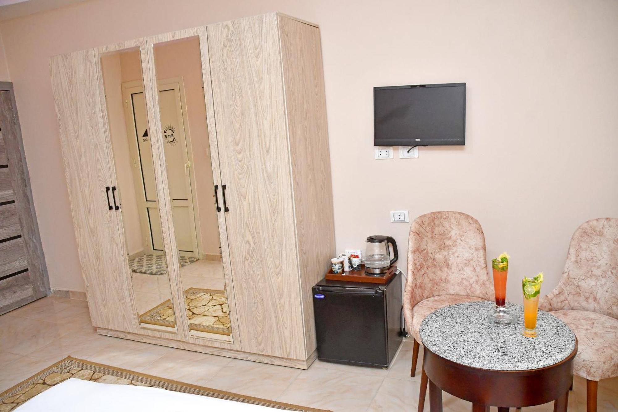 Nun Pyramids Hotel Kafrat al Jabal Номер фото