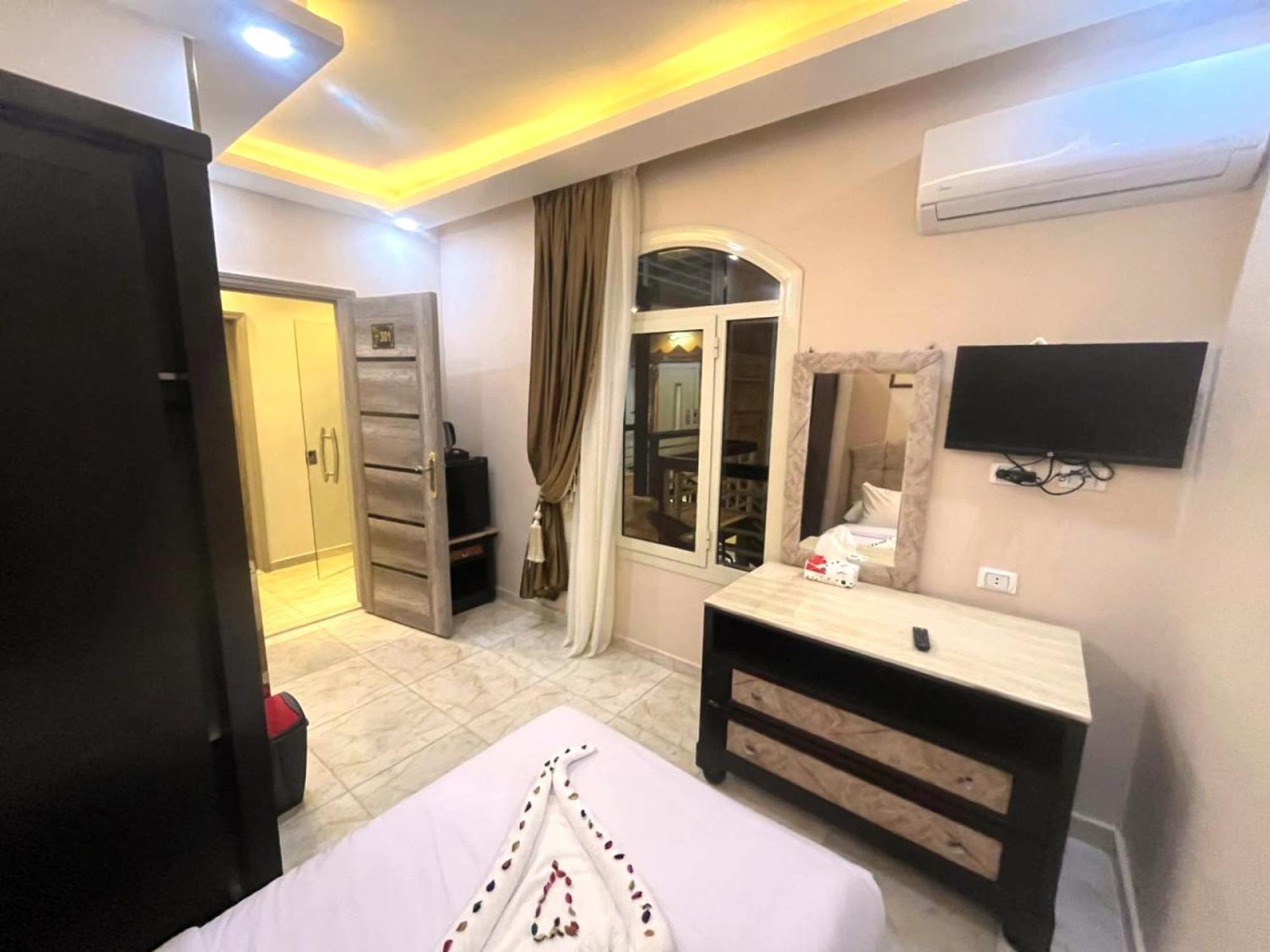 Nun Pyramids Hotel Kafrat al Jabal Номер фото